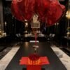 Custom pop-up gift box with roses, chocolates, music, and personalized photos for Valentine’s Day